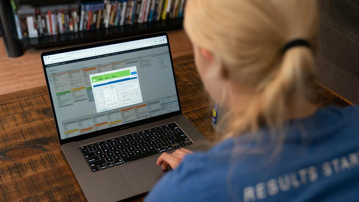 Start Your 7 Day Free Trial Today Image Of Coach With Laptop Looking At Trainingpeaks Screen