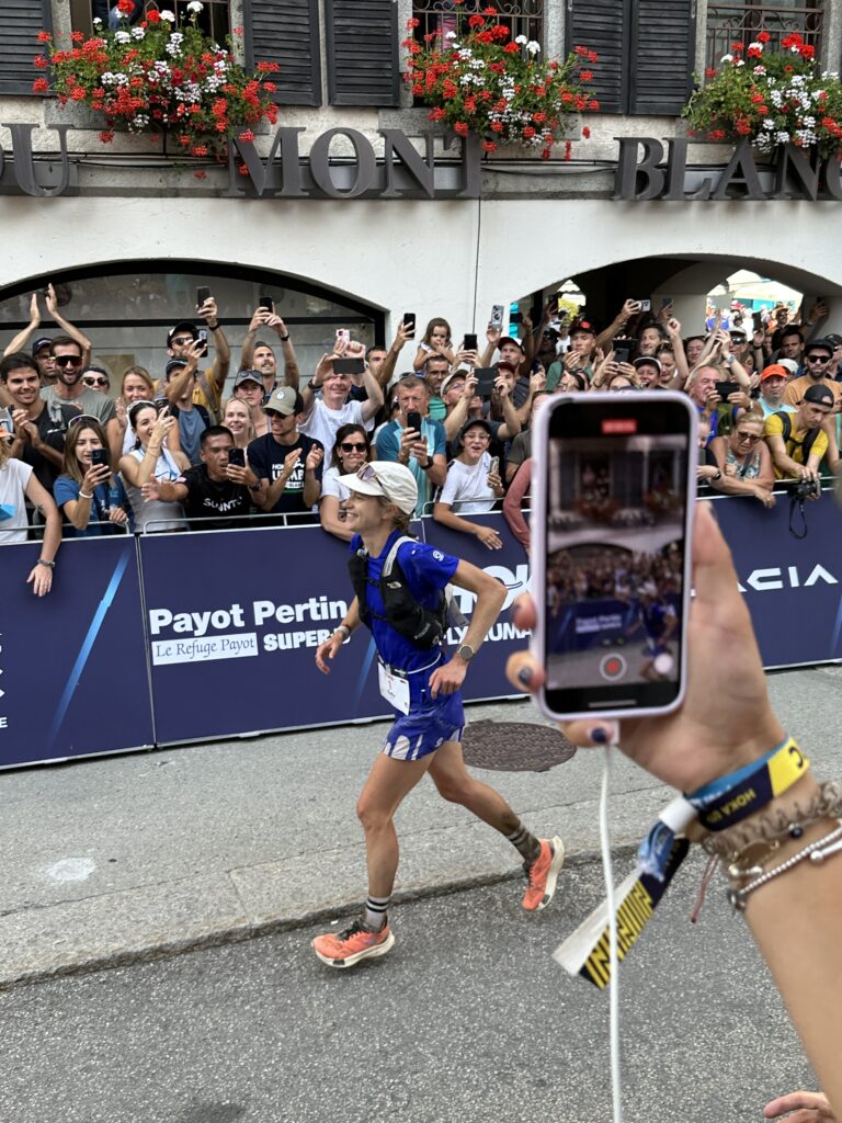 2024 Hoka UTMB Women's winner Katie Schide runs down the final 30 meters at Mont Blanc