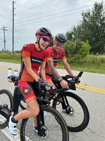 IRONMAN Coach Doug Guthrie and Adrienne Bunn cycling together training for Kona Championships 2023